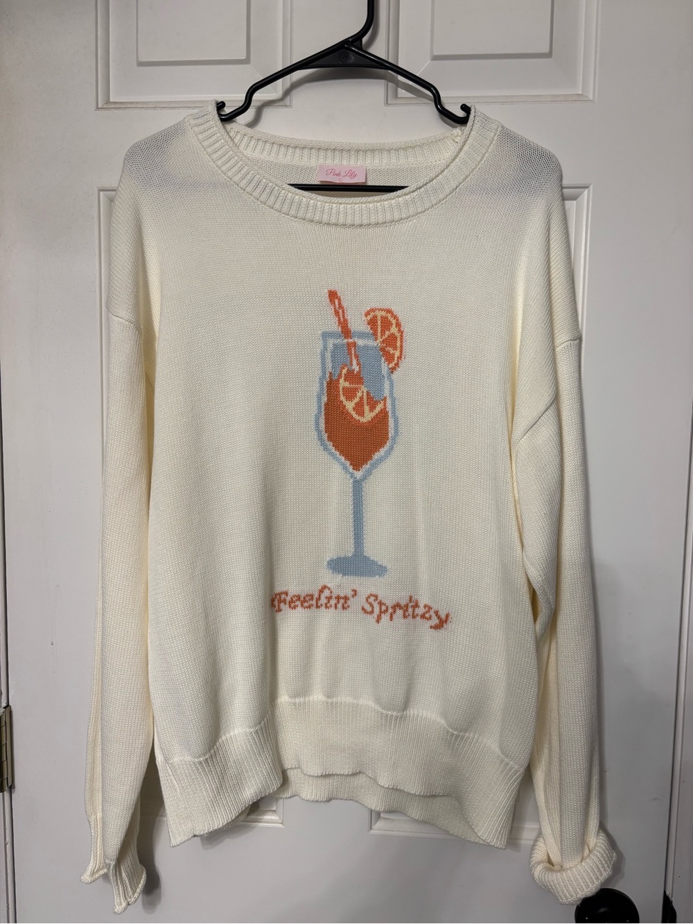 Pink lily Aperol spritz sweater